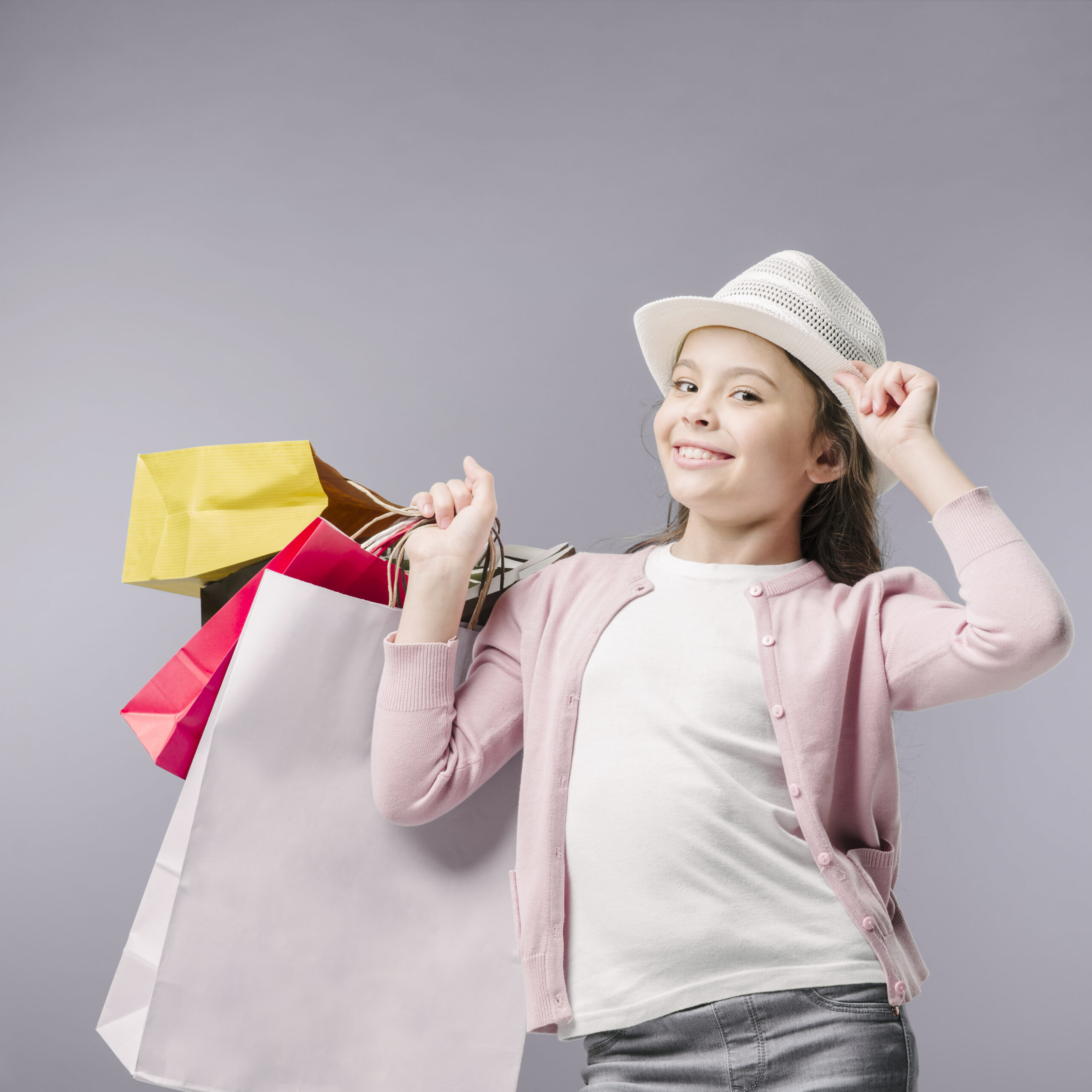 junior-posing-with-shopping-bags-hat